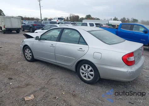 2003 Toyota Camry Xle z USA, uszkodzony, nr VIN 4T1BE30K53U680290